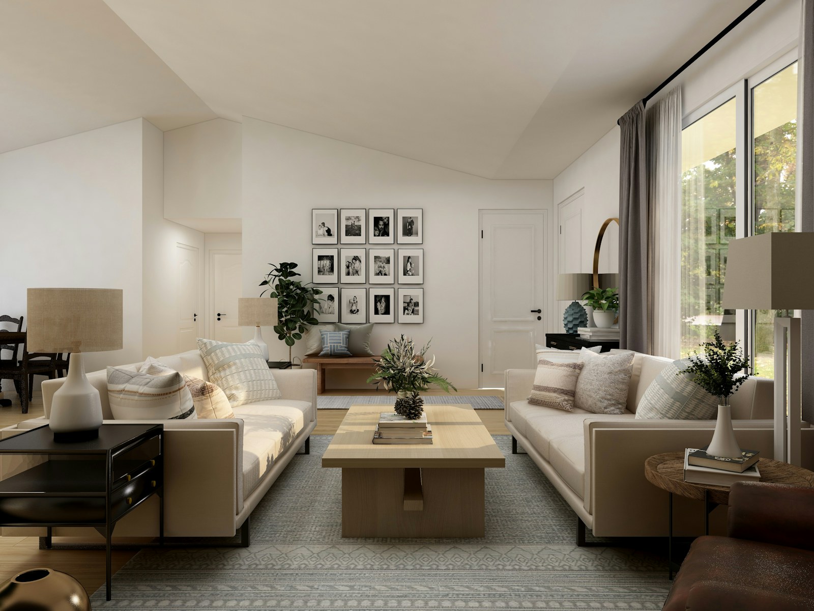 Bright modern living room with white sofas, natural light and tidy surfaces